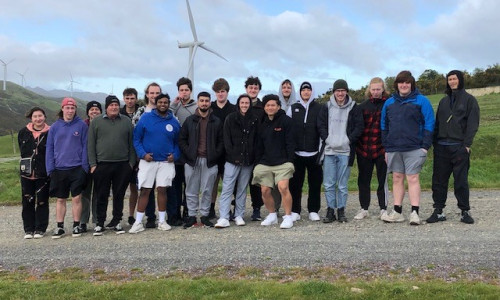 Whitireia and WelTec electrical apprentice grads at a windfarm